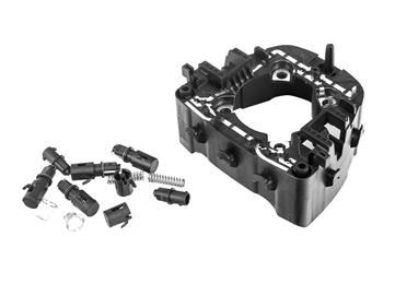 Hybrid plastics/metal airbag housing with integrated lead frame, co-developed and produced by Quadrant Creative Molding & Systems is proving an important saver of weight, packing space and costs.